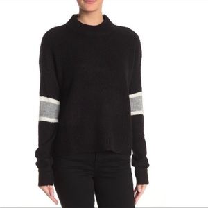 Black sweater with grey detail, size S.